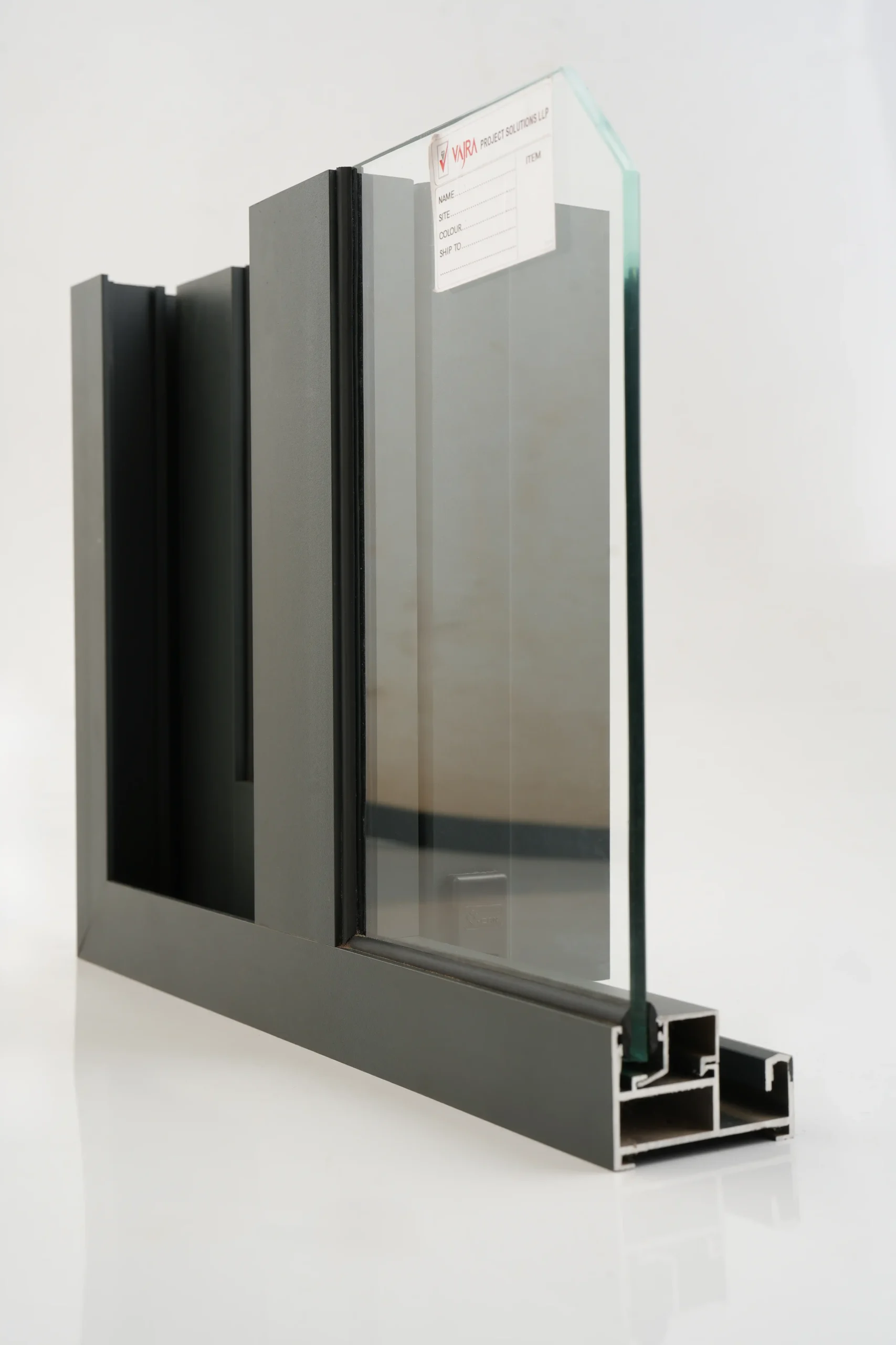A fixed window frame, cut to show the inside