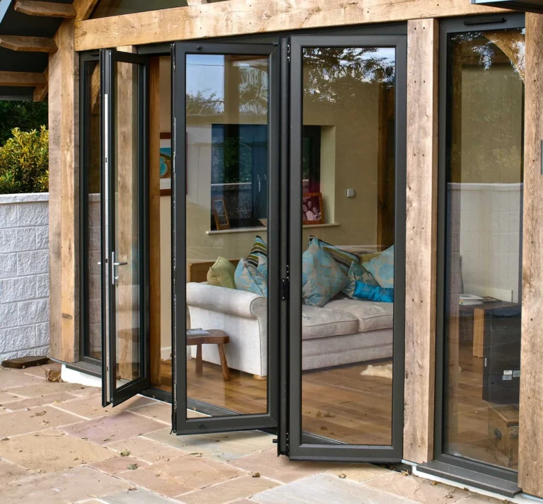 Folding glass doors opening onto a patio